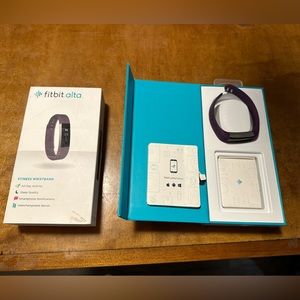 One size fits all, purple band, chargerless, USB included, Fitbit Alta.